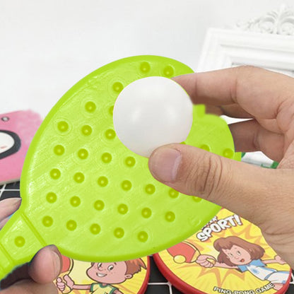 Different views of kidsâ€™ table tennis racquet and ball set