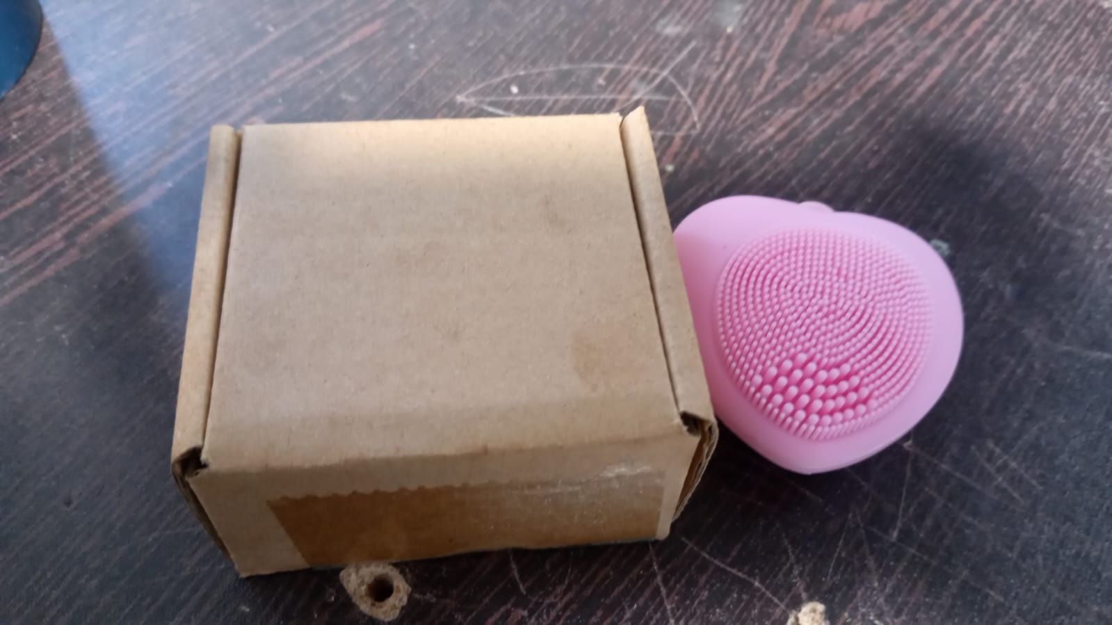 Silicone exfoliating face brush in heart shape for womenâ€™s skin care